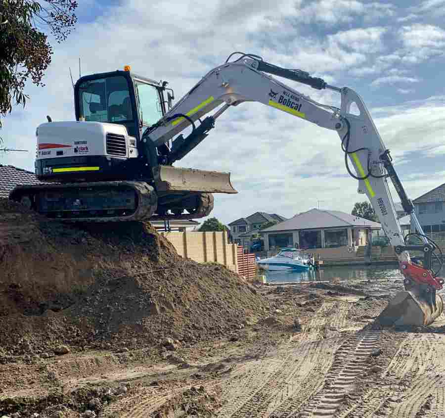 Excavator working near residential area